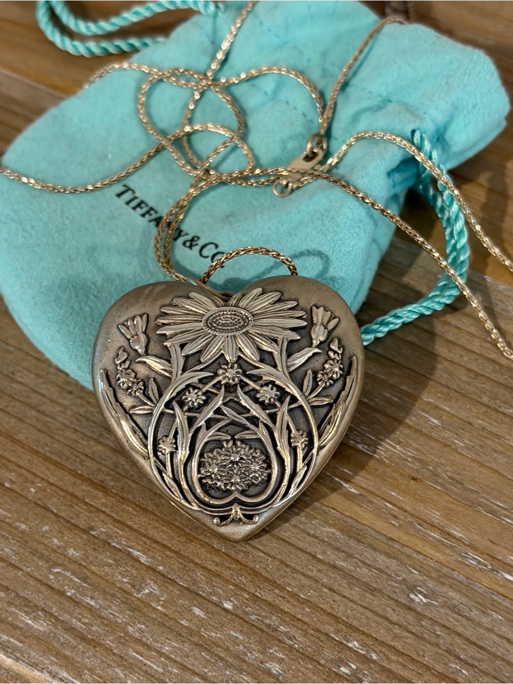 Tiffany & Co. Ziegfeld large silver Floral Heart Pendant Necklace. Never worn